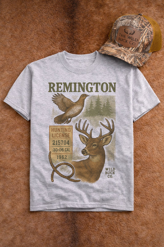 Gray t-shirt with Remington hunting graphic on a brown leather background